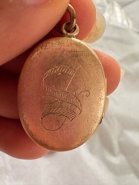 Antique gold S locket